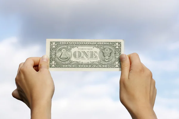 Dólar em mãos — Fotografia de Stock