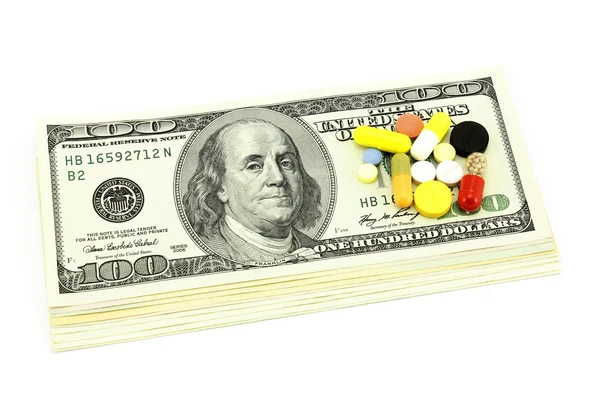 Tablets and dollars — Stock Photo, Image