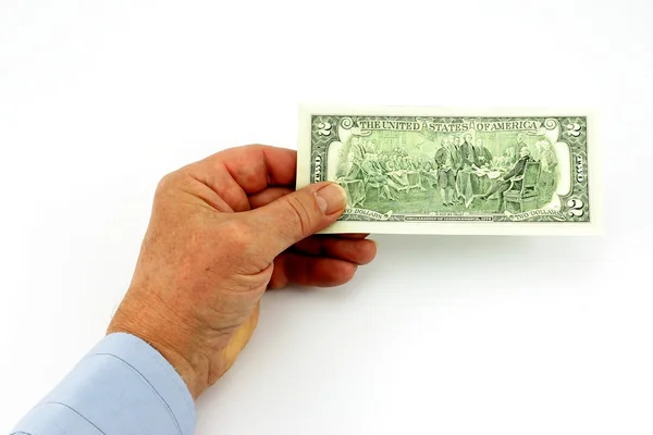 Dollar i en hand — Stockfoto