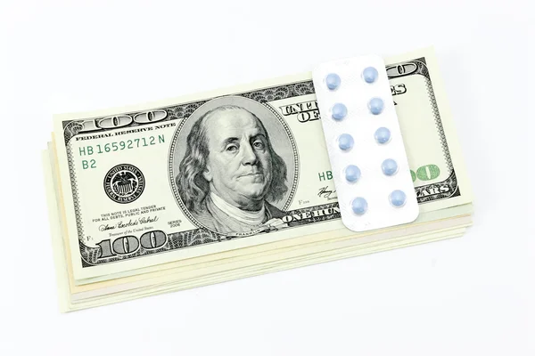 Dollars and medications — Stock Photo, Image