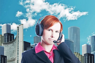 Handsome woman working in a call center clipart
