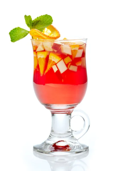 Glass of tea with fresh fruits and syrup — Stock Photo, Image