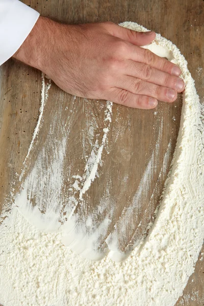 Bakers hand — Stock Photo, Image
