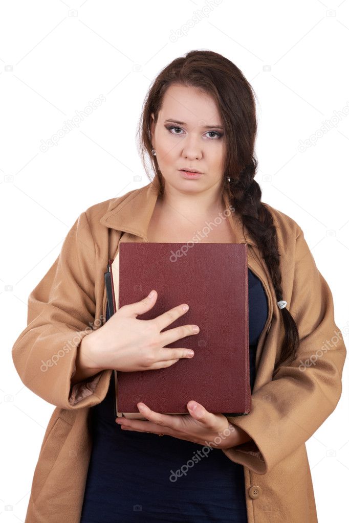 Plus size woman with thick volumes of books on a white