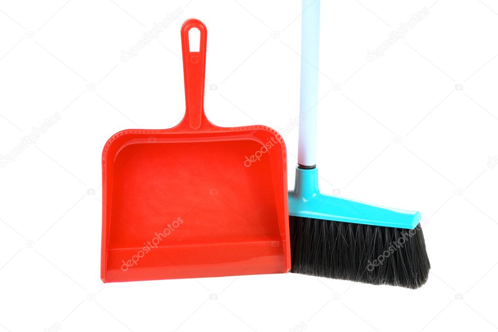 Scoop for dust and brush on a white background