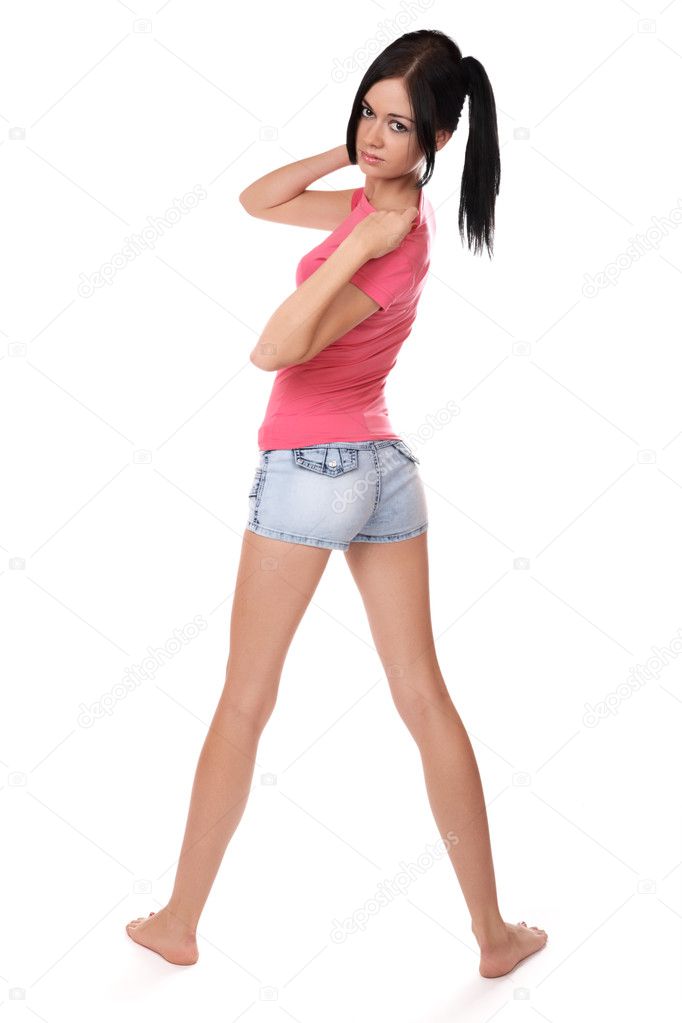 Girl in shorts to the utmost on a white
