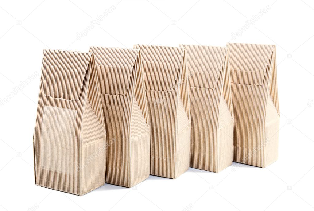 Row of boxes from the goffered cardboard on a white background