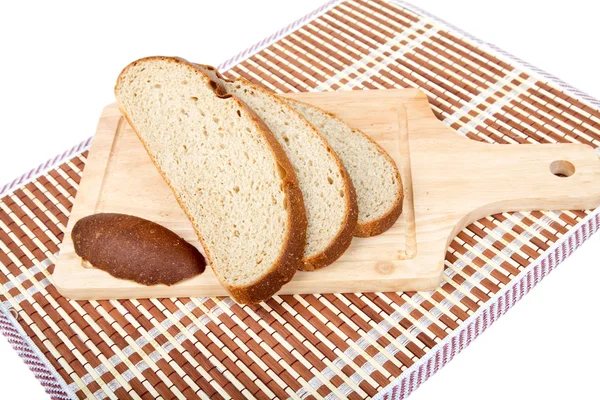 Zátiší s plátky chleba izolovaných na bílém — Stock fotografie