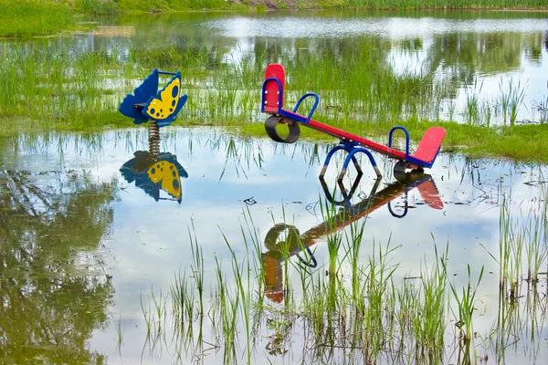 Flooded playground — Stock Photo, Image