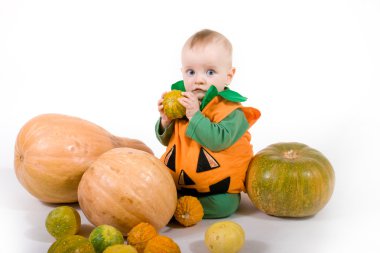 Baby in a Halloween pumpkin costume clipart