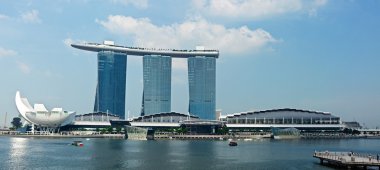 SINGAPORE - MAY 6: The Marina Bay Sands complex on May 6, 2011 in Singapore. Marina Bay Sands is an integrated resort and billed as the world's most expensive s stock vector