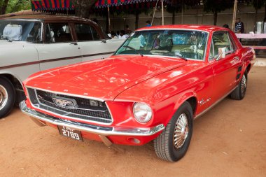 CHENNAI - INDIA - JULY 24: Ford Mustang (retro vintage car) on H clipart