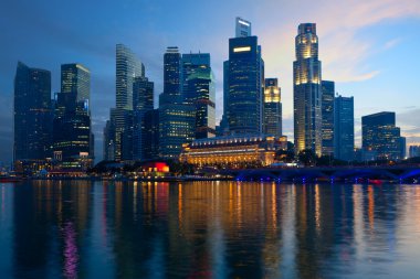 Singapore skyline in evening clipart