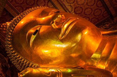 Reclining Buddha face clipart