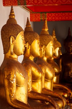 Sitting Buddha statues, Thailand clipart