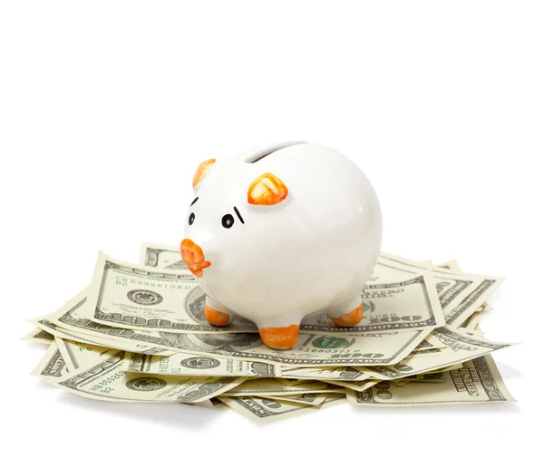 stock image Piggy bank on dollars