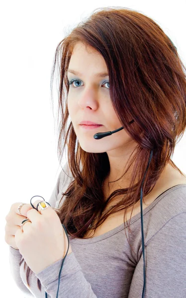 Ritratto di un'impiegata di successo di un call center con un auricolare — Foto Stock
