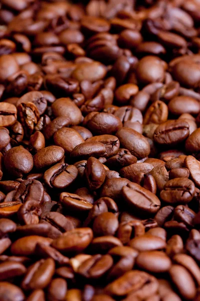 Hnědá káva, textura pozadí, close-up — Stock fotografie