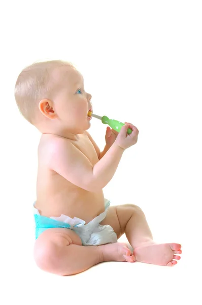 Menina pequena com escova de dentição — Fotografia de Stock
