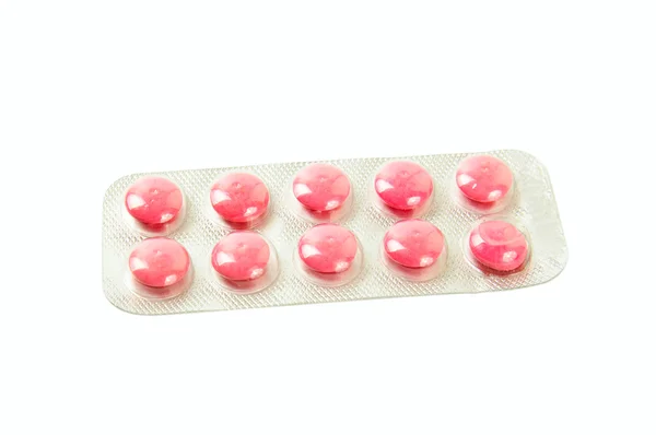 ピンクの錠剤を持つパッケージ — ストック写真