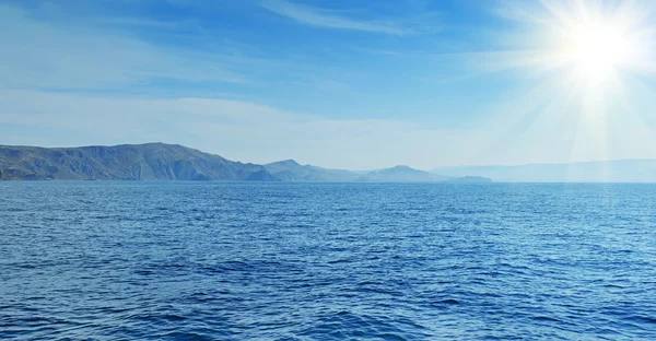 Sea panorama with sun — Stock Photo, Image