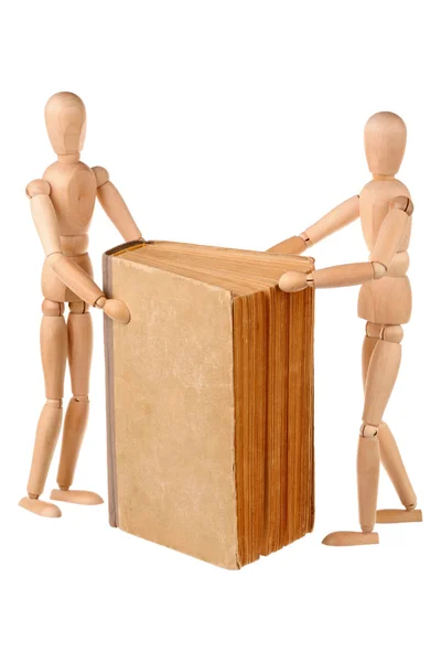 Two dummy and book — Stock Photo, Image