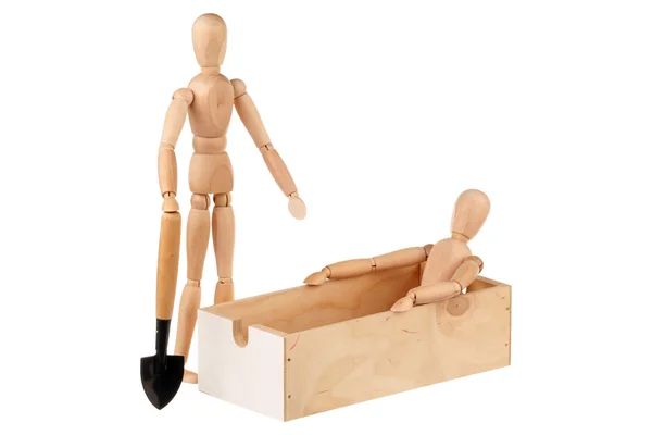 Dvě figuríny, dřevěná krabice a rýč — Stock fotografie