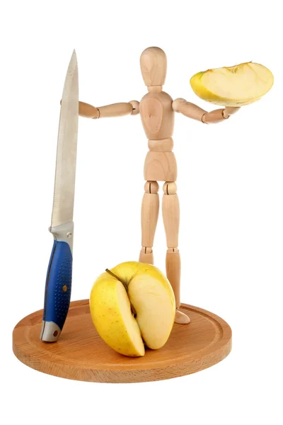 Figurína, nůž a apple — Stock fotografie
