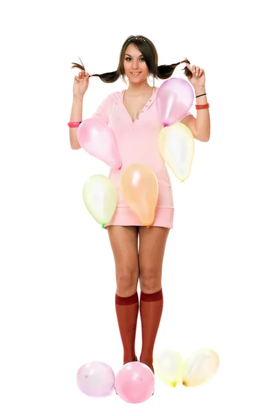 Beautiful sexy brunette girl with balloons — Stock Photo, Image