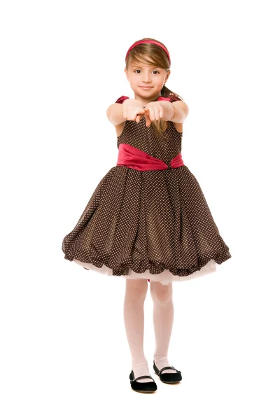 Aardige kleine dame in een bruine jurk — Stockfoto