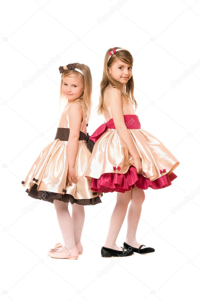 Two nice little girls in a dress