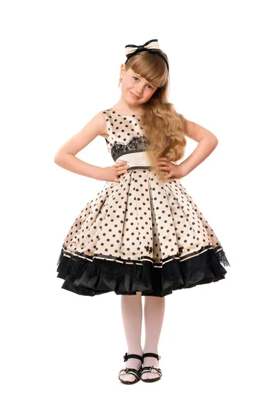 Vacker liten flicka i en klänning — Stockfoto