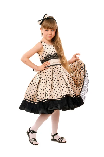 Härlig liten flicka i en klänning — Stockfoto