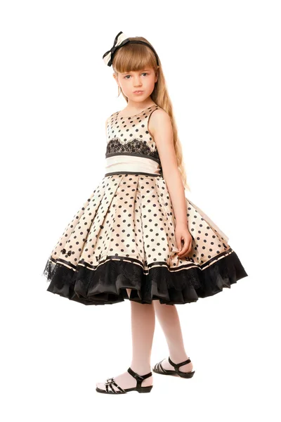 Charmig liten flicka i en klänning — Stockfoto