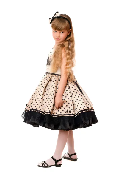 Attractive little girl in a dress — Stock Photo, Image