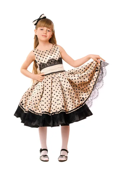Vrij klein meisje in een jurk — Stockfoto