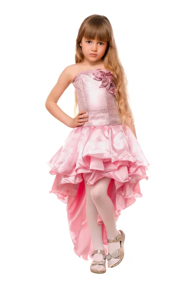 Vrij klein meisje in een roze jurk — Stockfoto