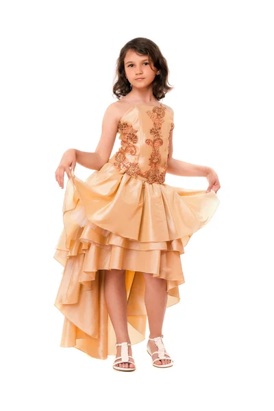 Lovely little girl in a evening dress Stock Photo