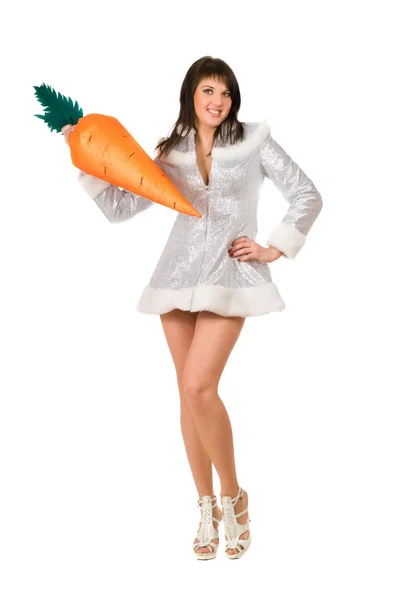 Young brunette with a carrot — Stock Photo, Image