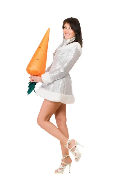 Sexy young brunette with a carrot — Stock Photo, Image