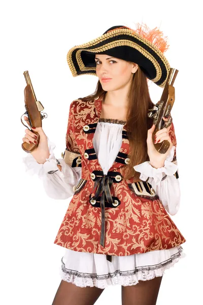 Attraktiv kvinna med kanoner utklädda till pirater — Stockfoto