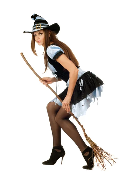 Attractive young woman with a besom — Stock Photo, Image