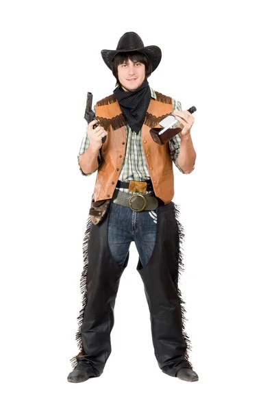 Grinsender Cowboy mit Pistole — Stockfoto