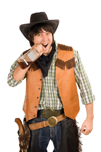 Cowboy con una bottiglia di whisky — Foto Stock