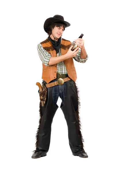Happy cowboy with a bottle — Stock Photo, Image