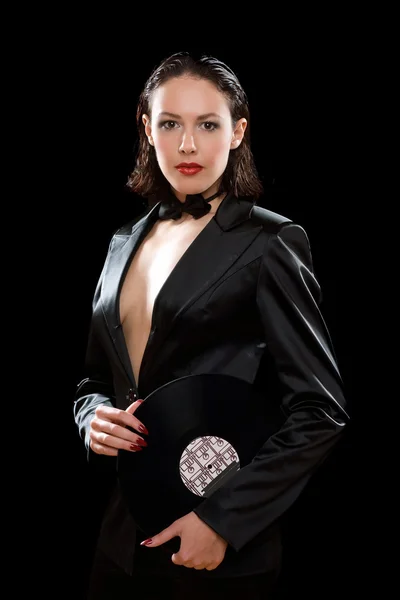 Nádherná brunetka na sobě černý oblek — Stock fotografie