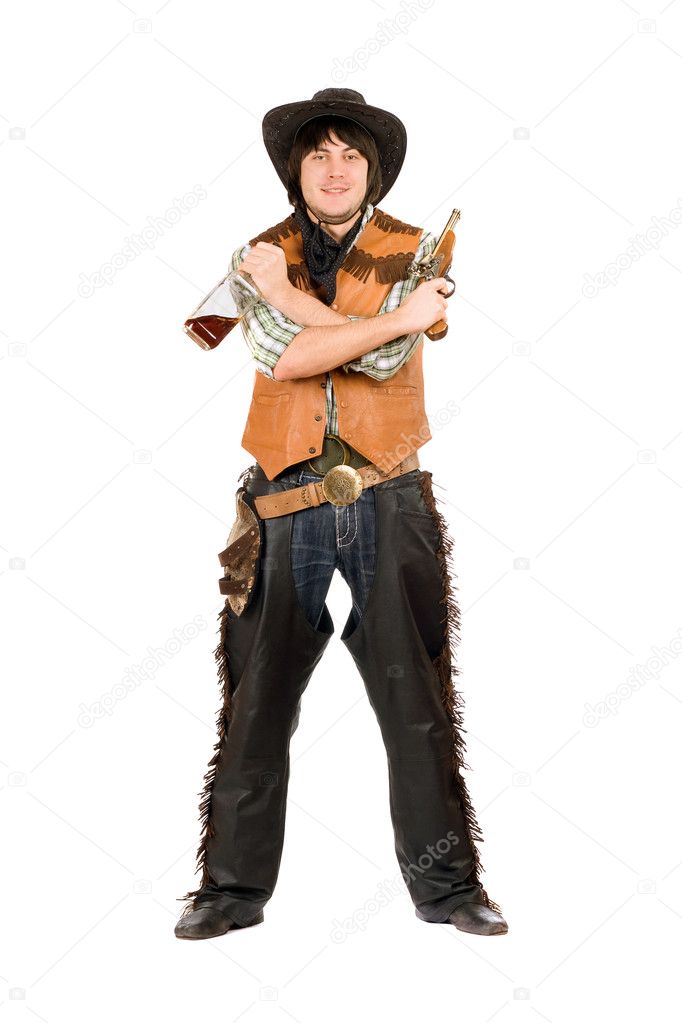 Happy cowboy with a bottle and gun