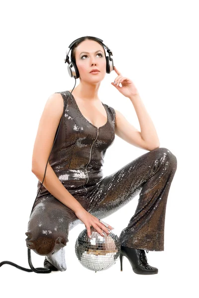 Attractive young brunette in headphones — Stock Photo, Image