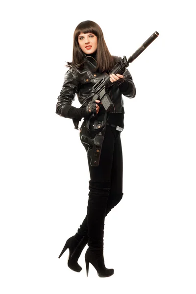 Feminino em preto com arma — Fotografia de Stock