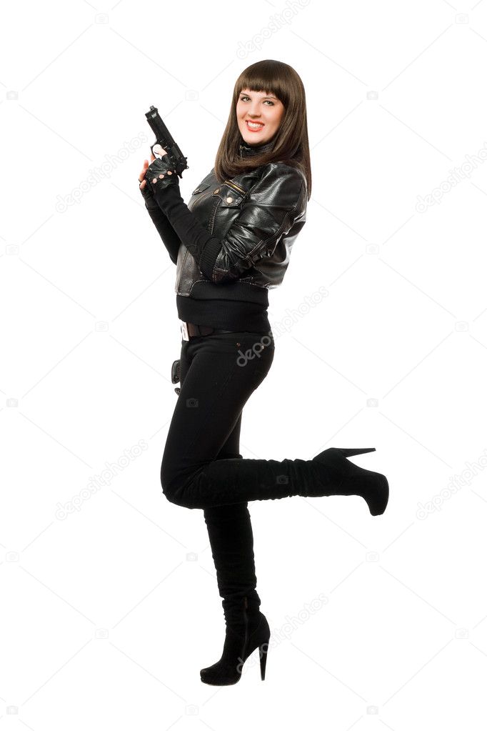 Smiling armed girl in boots